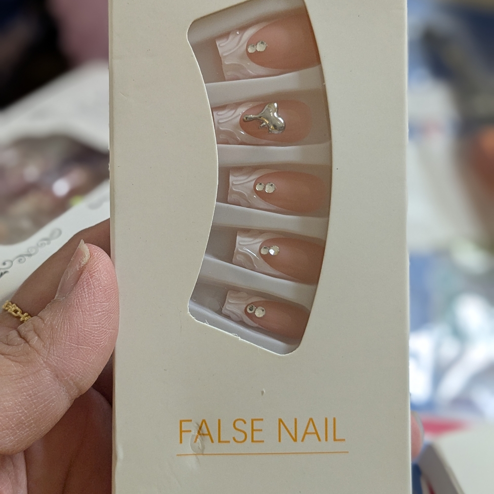Elegant Nude False Nails with Silver Accents